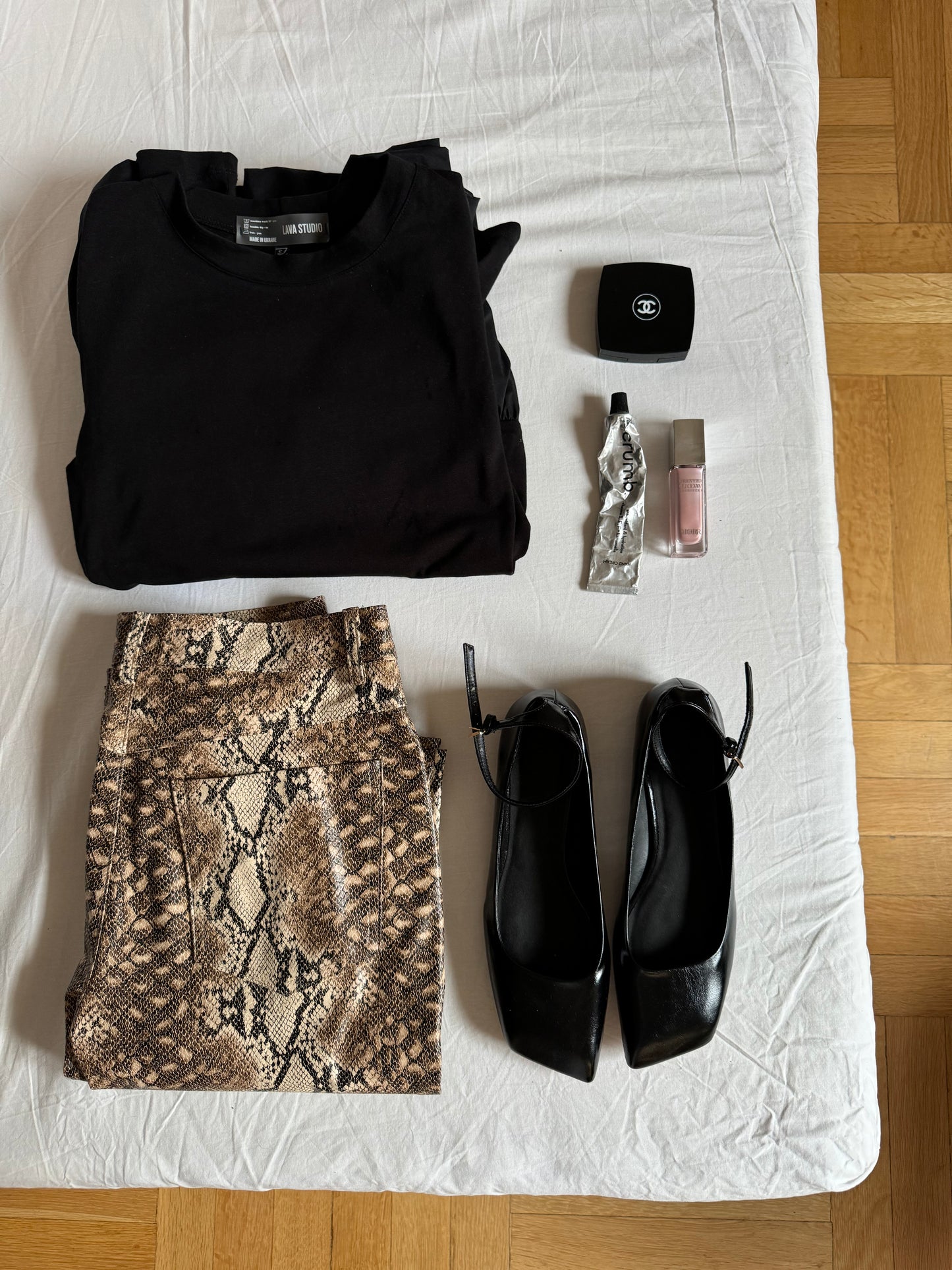 Штани з еко-шкіри з принтом